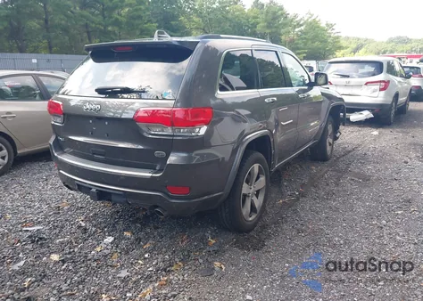 2015 Jeep Grand Cherokee Overland из США, поврежденный, VIN 1C4RJFCG7FC667221